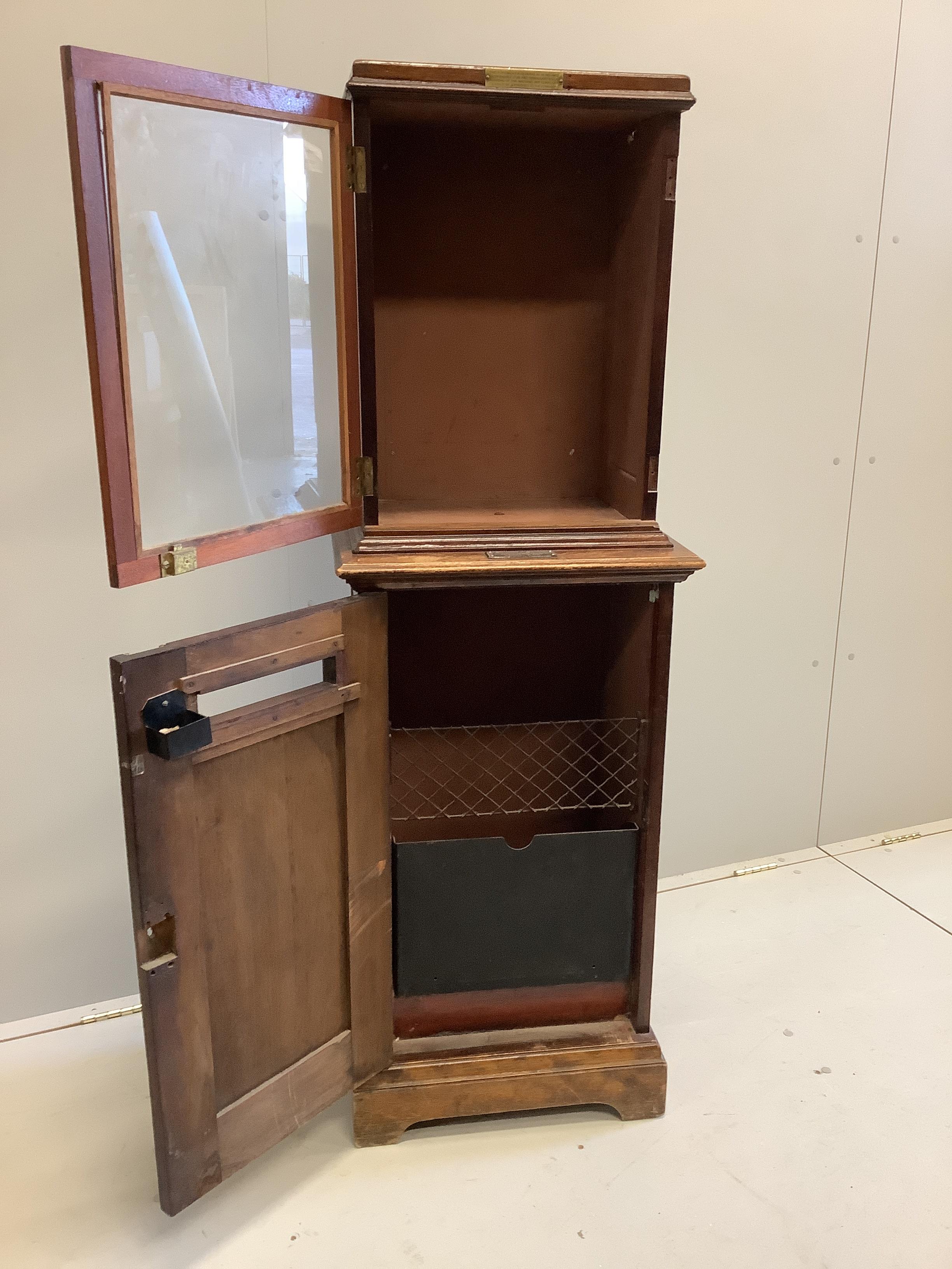 An early 20th century Hall Accessories Ltd., mahogany telephone/internal posting box, width 49cm, depth 35cm, height 148cm